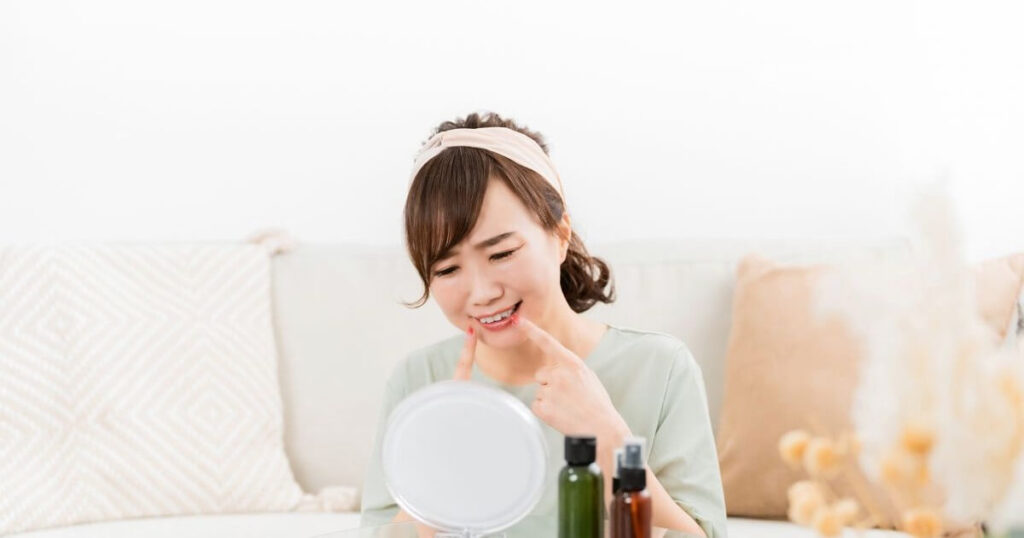 歯の治療を後悔する女性